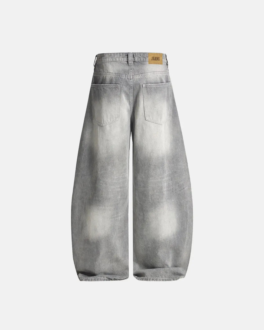 Blue acid wash barrel jeans by INFLATION featuring a relaxed fit and distressed detailing, styled with a casual streetwear look.