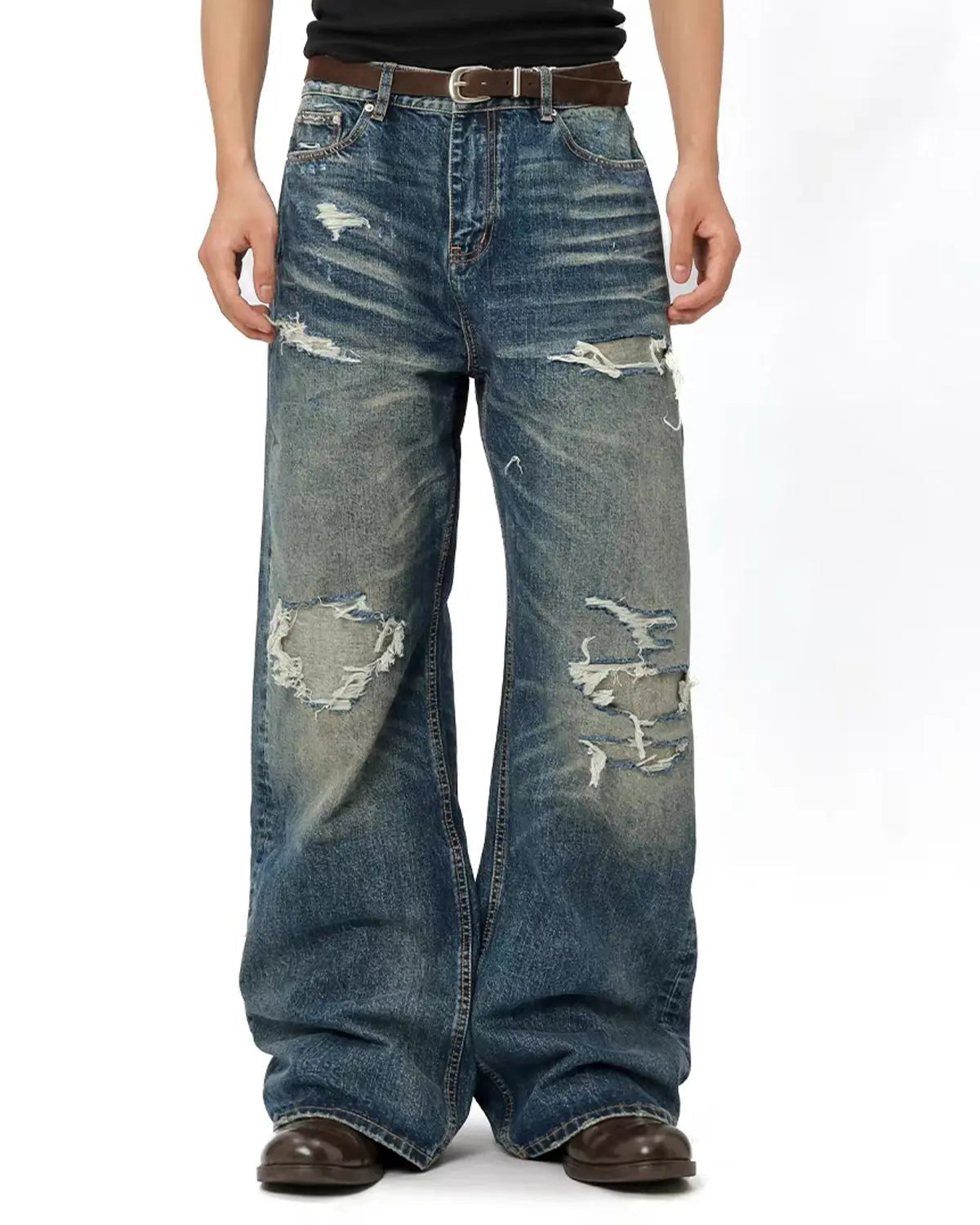 Vintage distressed baggy jeans from INFLATION Streetwear with a relaxed fit and worn-in denim look.