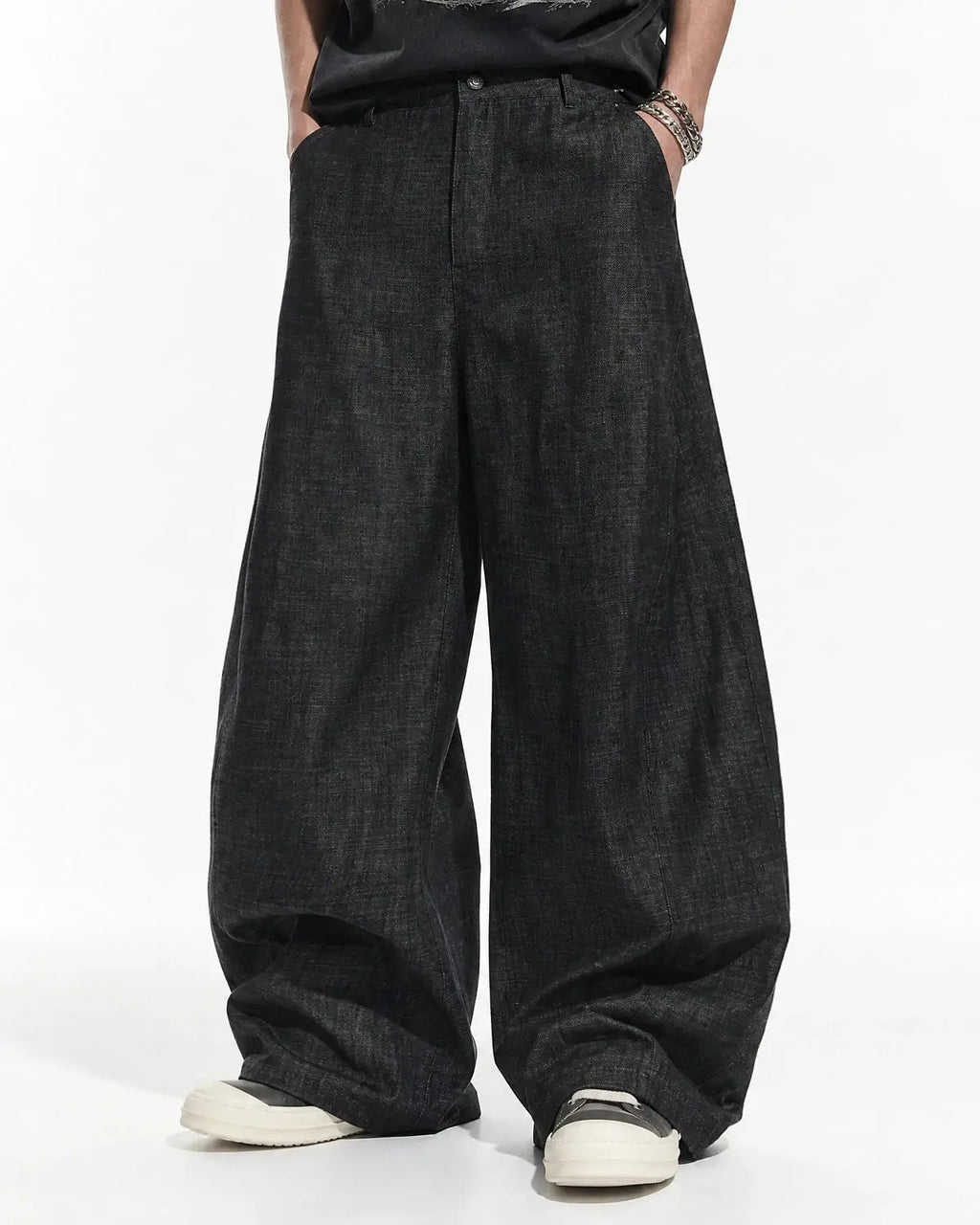 Lightweight raw barrel jeans by INFLATION featuring a relaxed fit, distressed details, and classic denim styling.