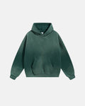 Acid washed ripped fleece hoodie by INFLATION featuring distressed details and a relaxed streetwear style.