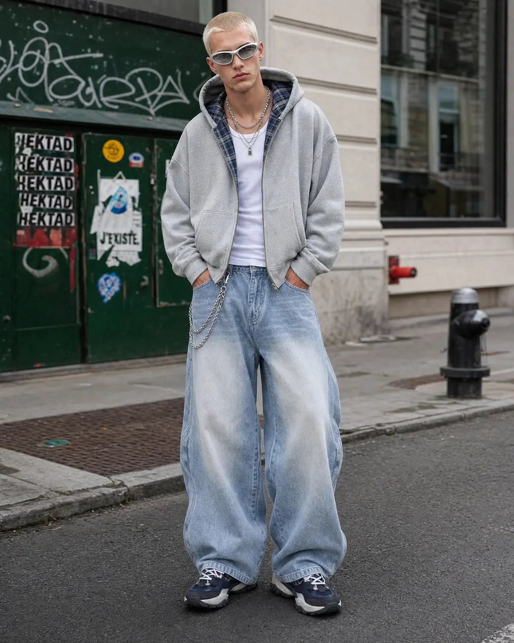 Inflation Wave Washed Baggy Jeans, relaxed fit denim pants with a washed finish and oversized style, displayed on a model.