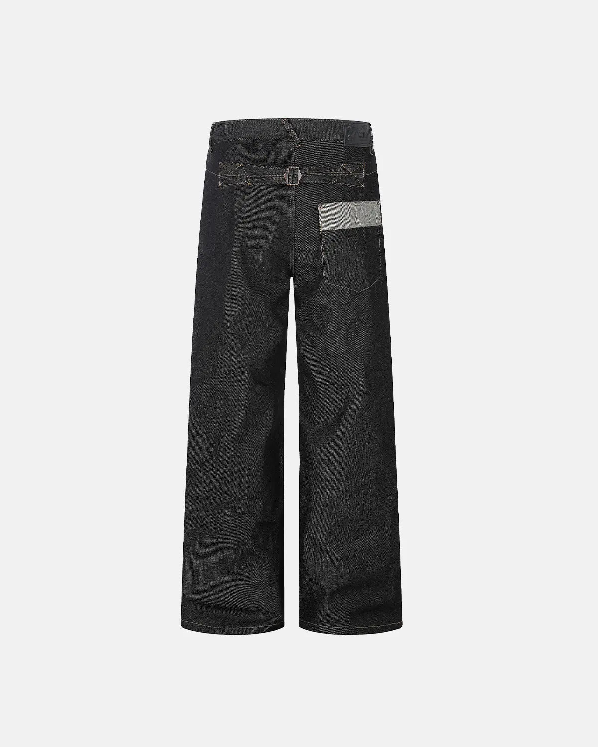 Inflation Button Fly Raw Baggy Jeans showcasing loose fit, rugged denim with button closure and streetwear style.