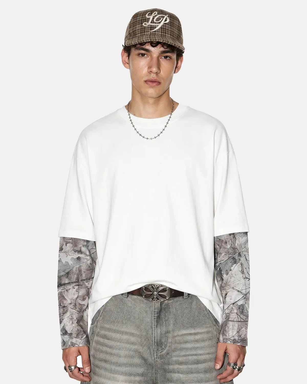 Inflation Streetwear camo layered oversized T-shirt featuring a relaxed fit and bold camouflage pattern on soft fabric.