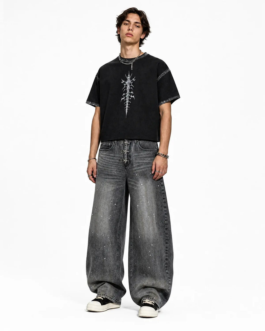 Metal clasp washed barrel jeans from INFLATION Streetwear, showing the distressed denim and metal button details.