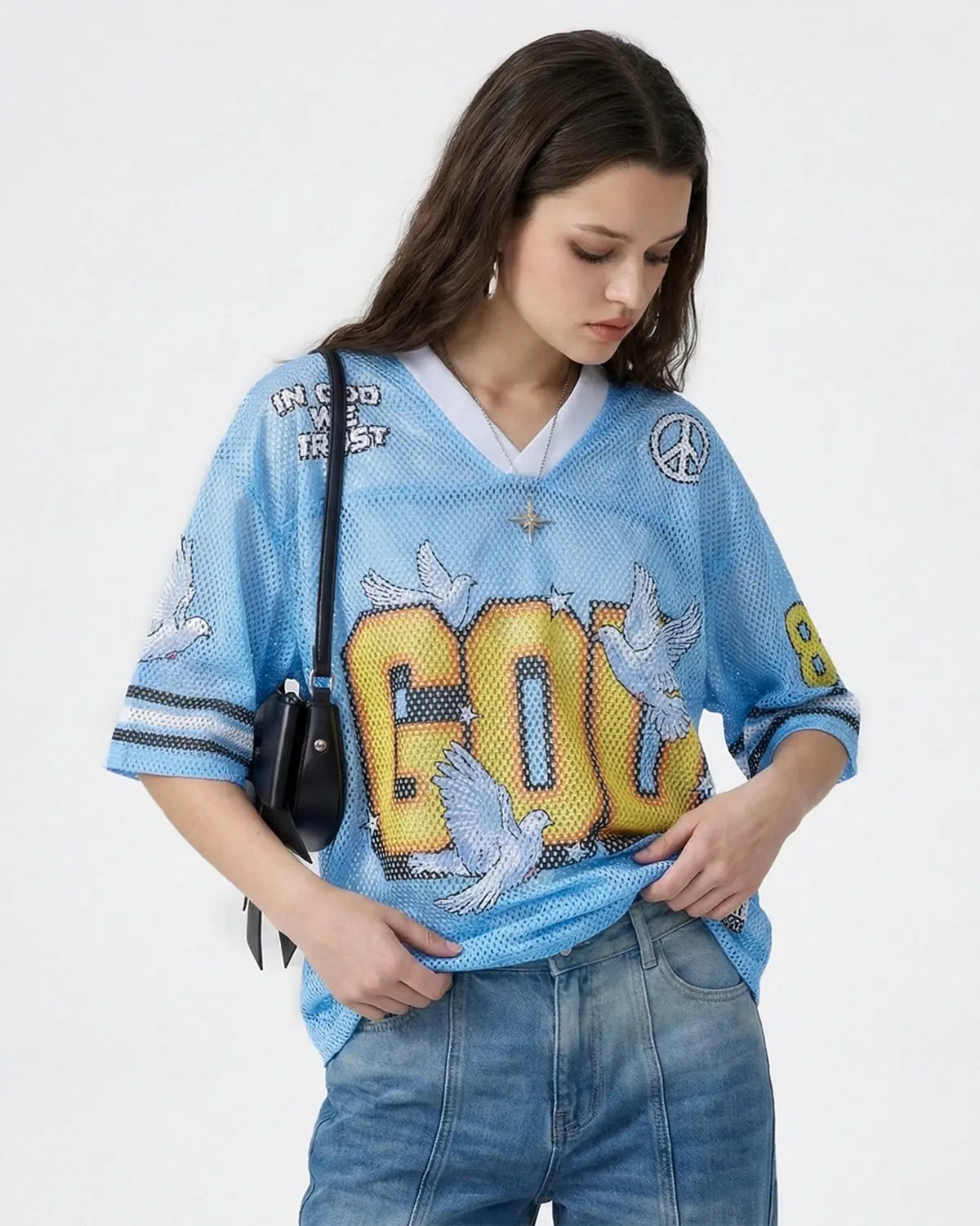 Inflation Streetwear Dove graphic mesh football jersey featuring bold dove logo and breathable mesh fabric in black and white.