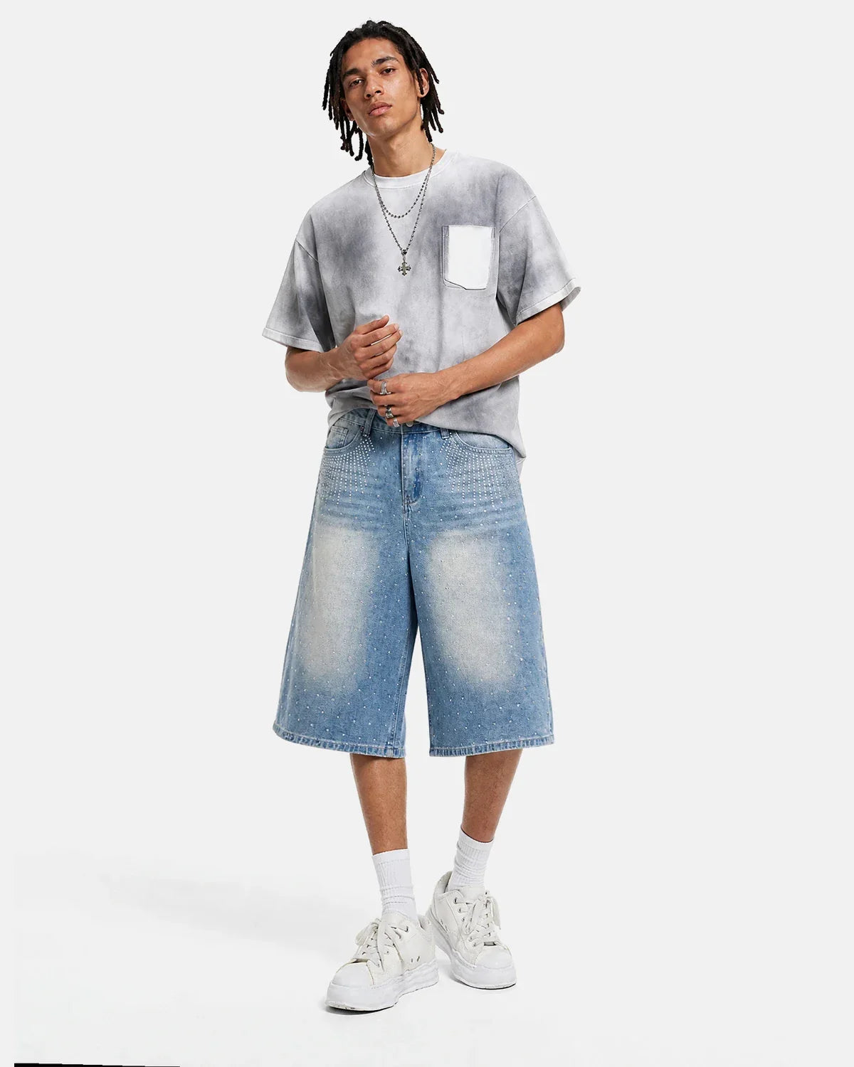 Blue rhinestone baggy jeans shorts by INFLATION, featuring a relaxed fit, rhinestone embellishments, and distressed denim details.
