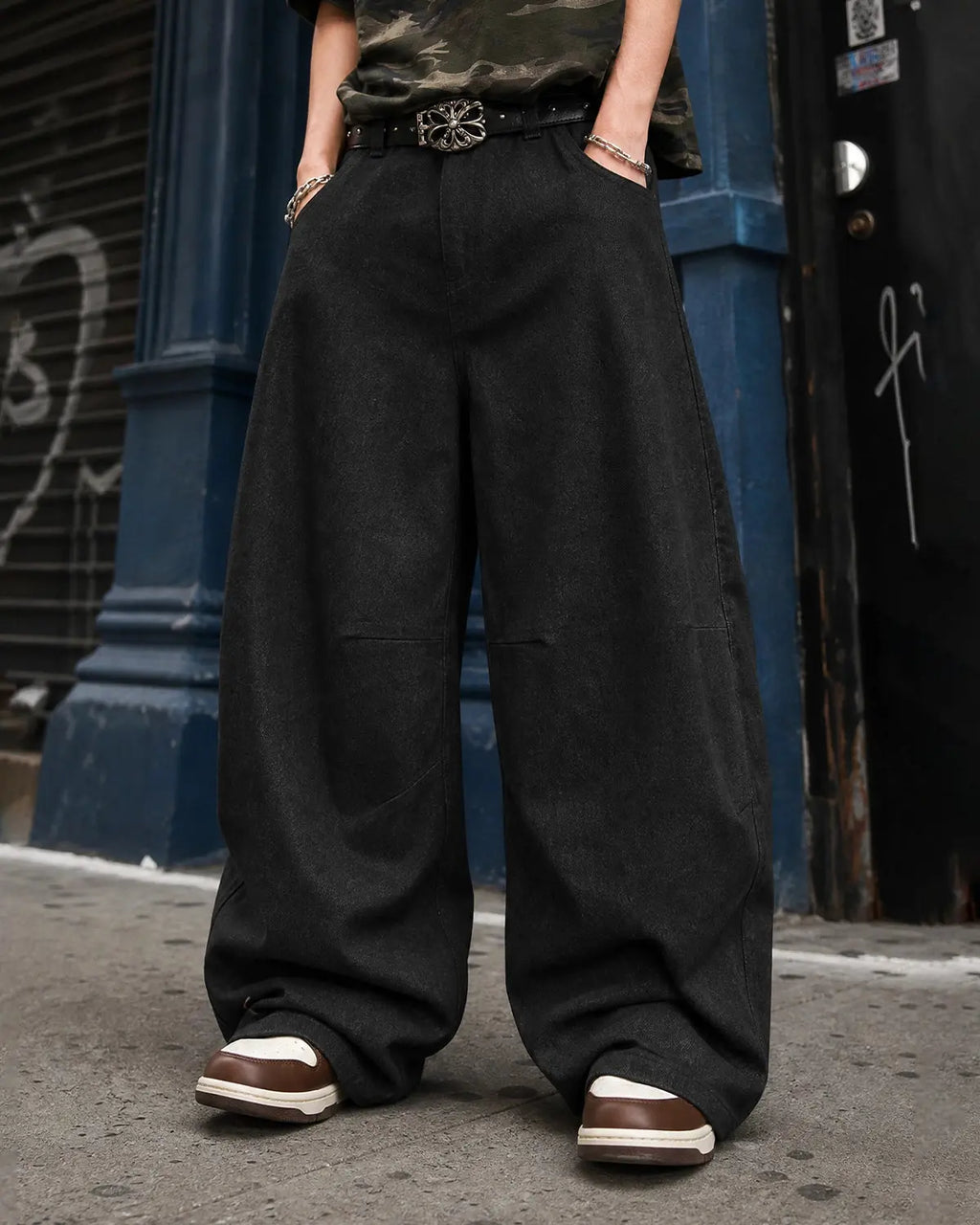 Raw Baggy Barrel Jeans by INFLATION Streetwear, showcasing oversized, distressed denim with a relaxed fit and raw hem details.