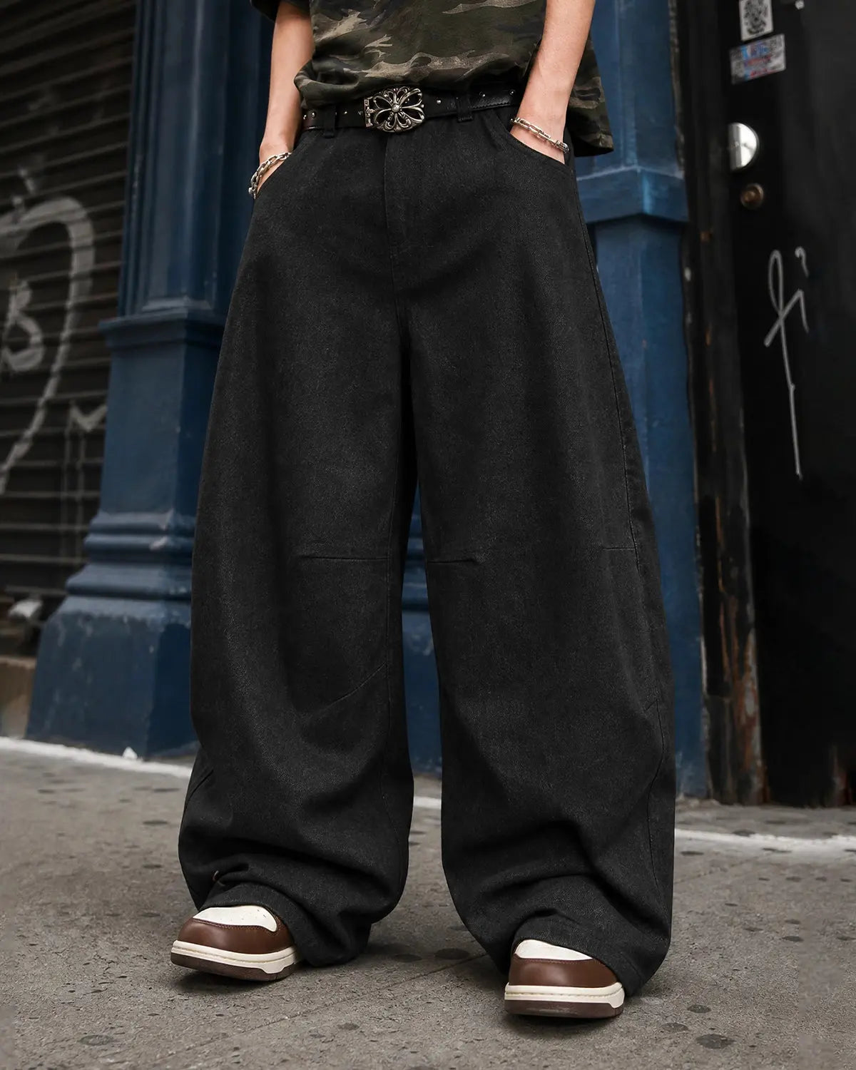 Raw Baggy Barrel Jeans by INFLATION Streetwear, showcasing oversized, distressed denim with a relaxed fit and raw hem details.