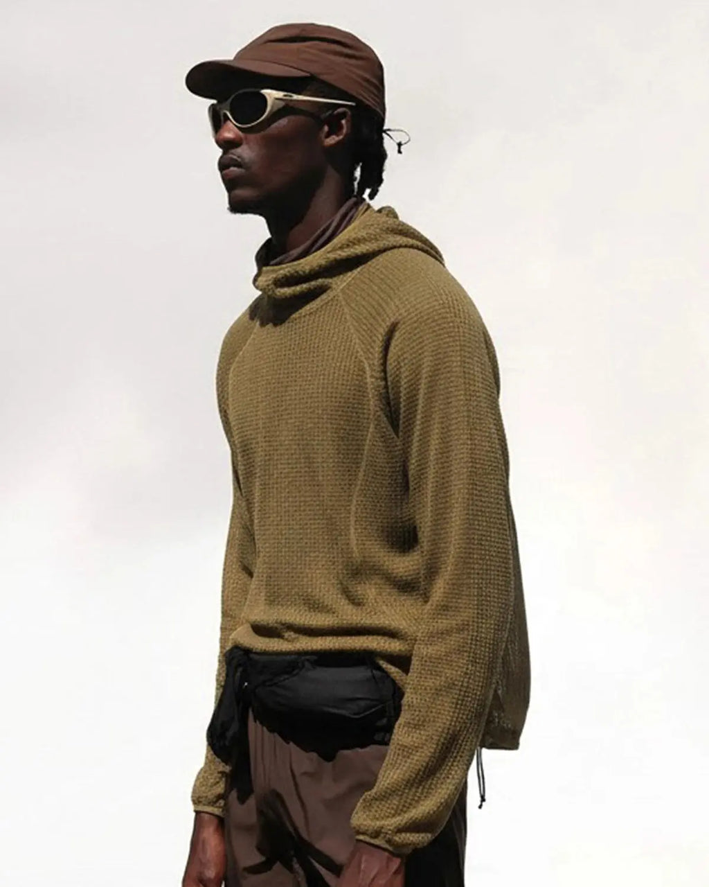Inflation Thermolite® lightweight grid texture hoodie in black, featuring a casual streetwear style with a relaxed fit.