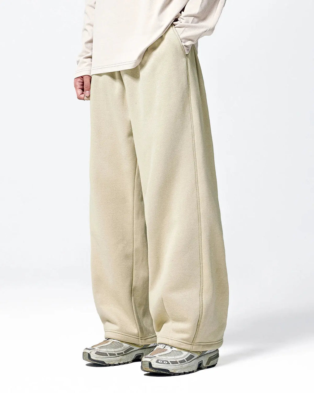 Inflation brand thermal fleece sweatpants with stretch fabric, showing the soft, cozy material and relaxed fit design.