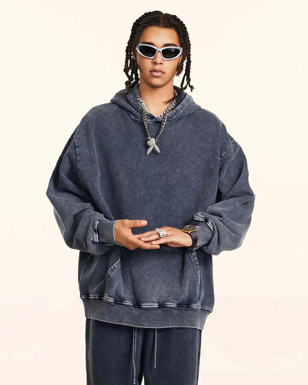 Acid washed French Terry hoodie by INFLATION featuring a relaxed fit and casual streetwear style, shown on a model.