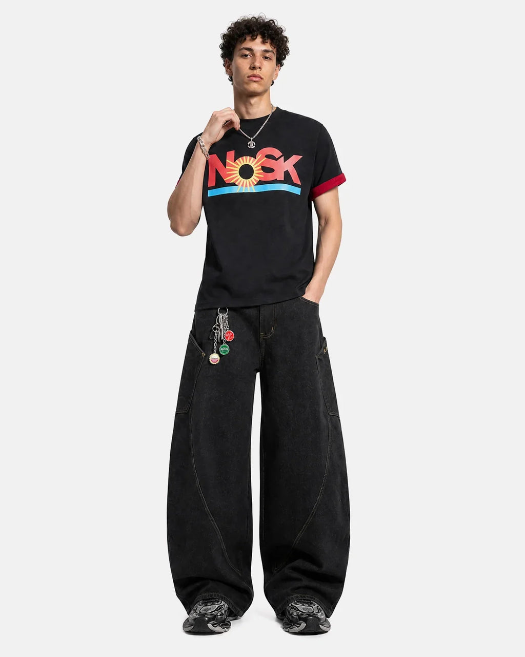 Inflation Streetwear graphic layered T-shirt featuring bold design, casual fit, and modern street style in vibrant colors.