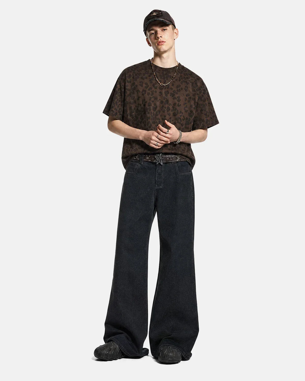 Inflation Super Raw Flared Baggy Jeans displayed on a hanger, showcasing their relaxed fit and raw hem detail.