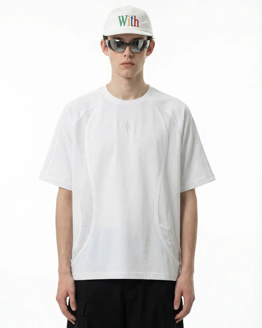 Inflation Streetwear mesh patchwork embroidered T-shirt with colorful stitching and detailed embroidery on a casual fit shirt.