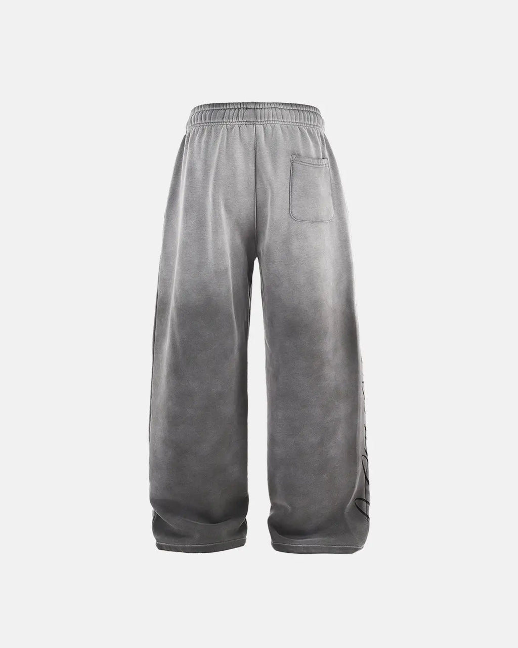 Acid washed black sweatpants by INFLATION, streetwear style, with relaxed fit and casual design, shown on a model.