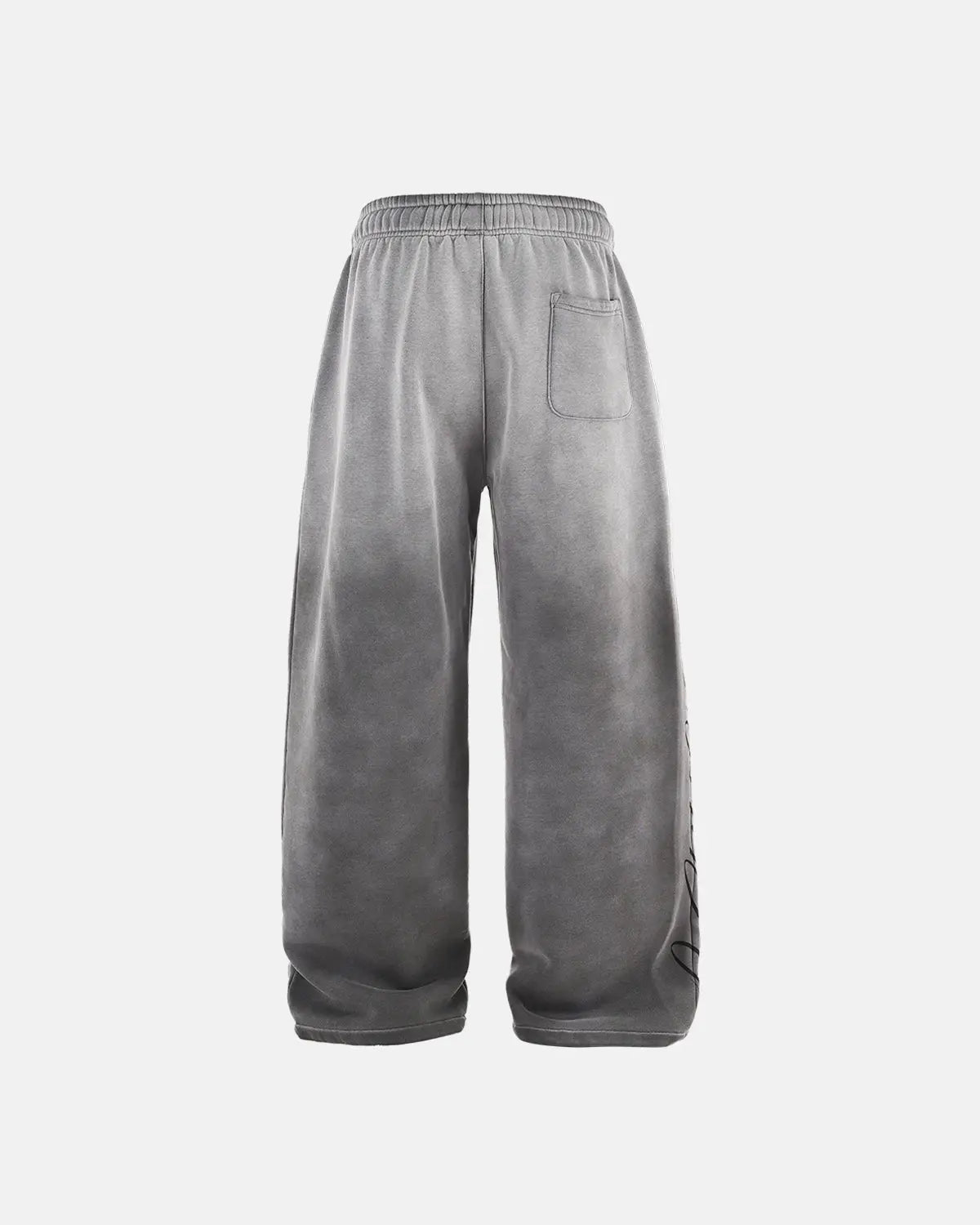 Acid washed black sweatpants by INFLATION, streetwear style, with relaxed fit and casual design, shown on a model.