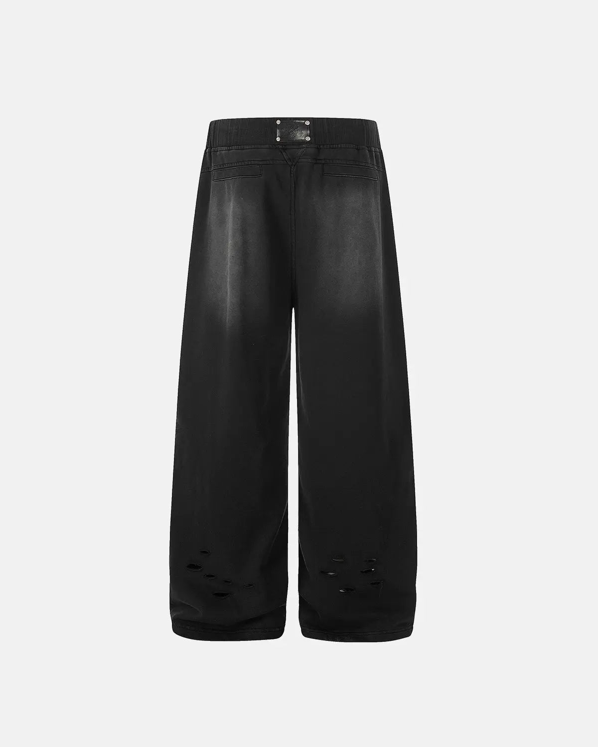 Distressed washed baggy sweatpants by INFLATION featuring a relaxed fit and faded, worn-in style on soft fabric.