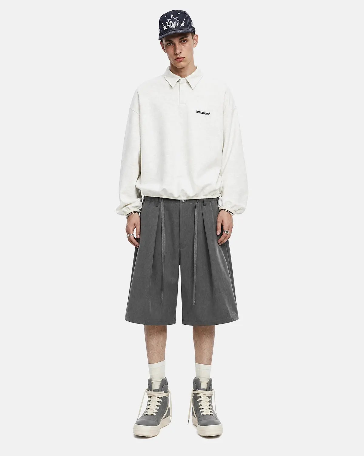 Inflation streetwear drawstring wide-leg tailored shorts with a relaxed fit and adjustable waistband, made from lightweight fabric.