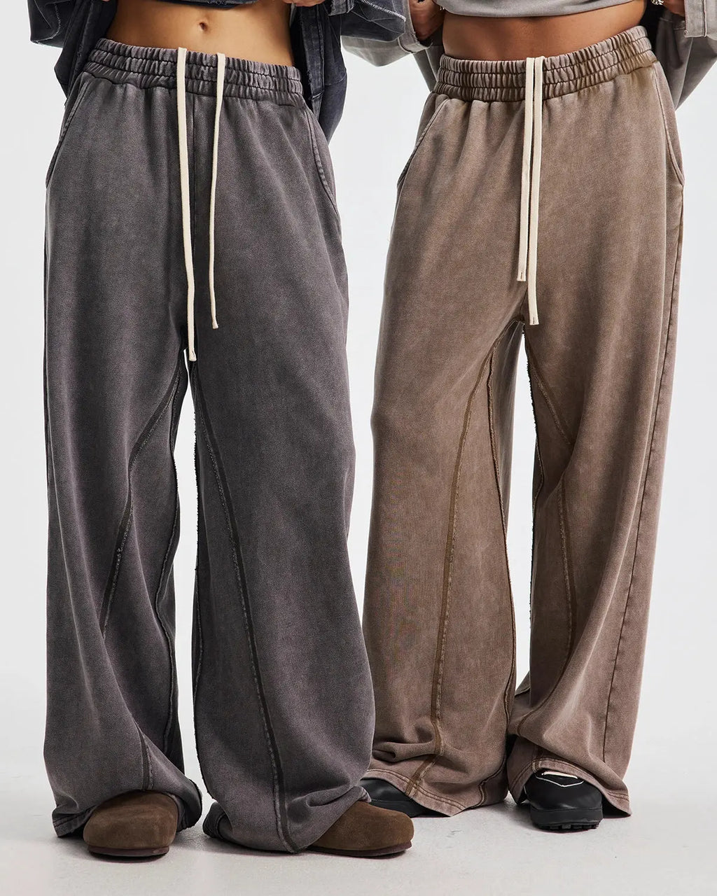 Inflation brand straight leg acid wash sweatpants with relaxed fit and casual style, shown on a mannequin.