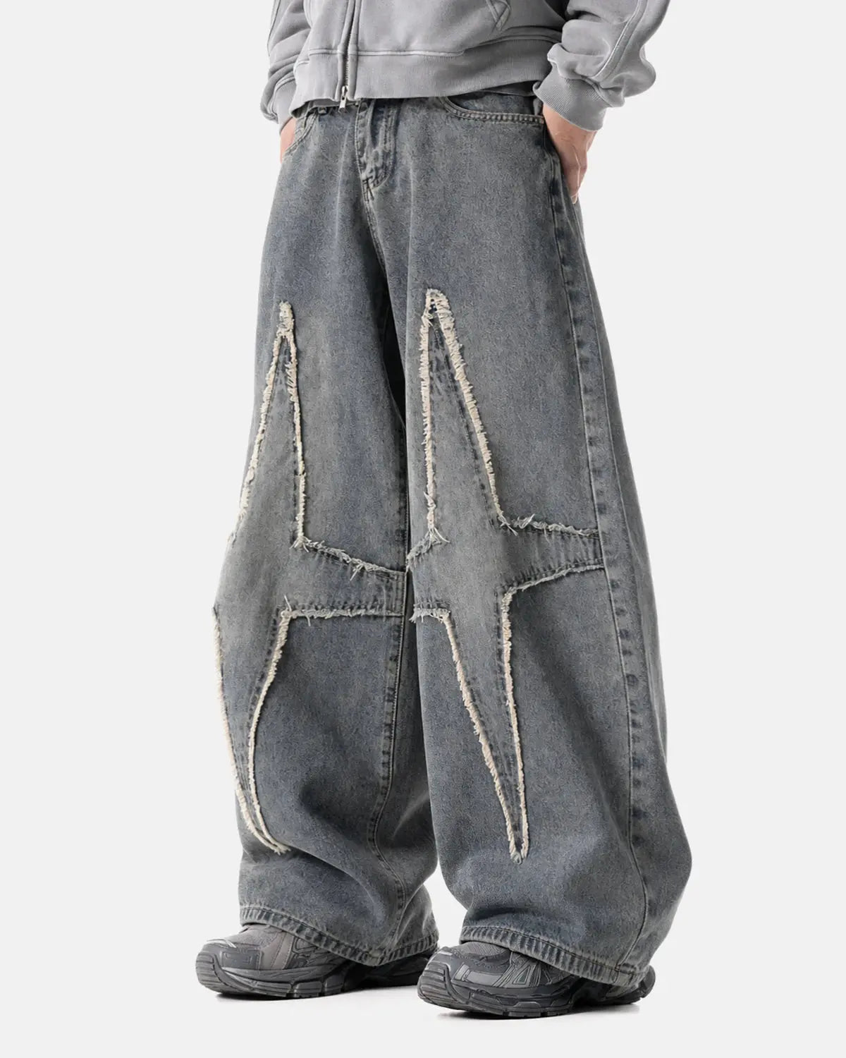 Inflation Star Patched Baggy Jeans with distressed details and patchwork design, casual streetwear style.