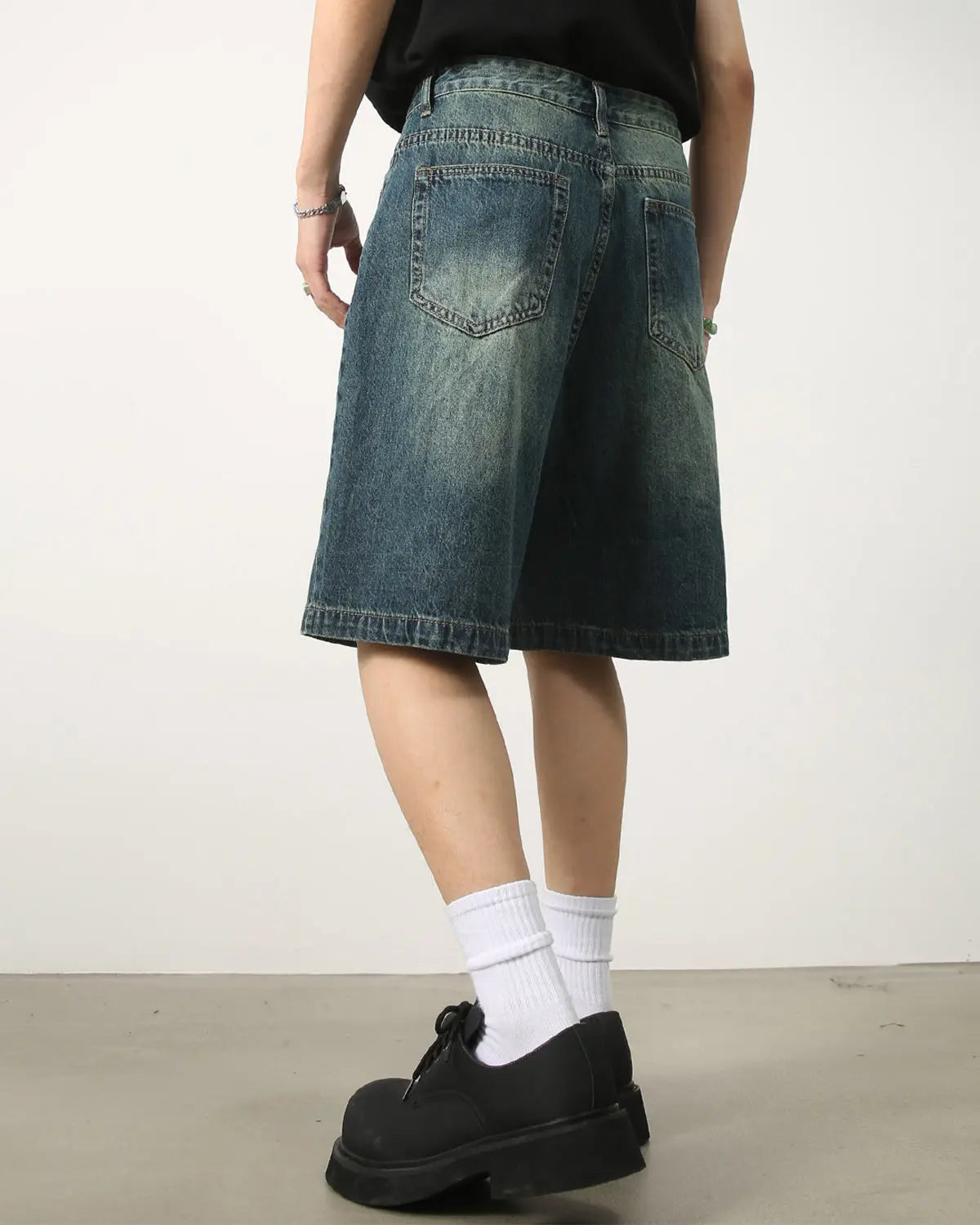 Washed knee-length denim jorts from Inflation Streetwear, casual pants with a relaxed fit and distressed denim style.