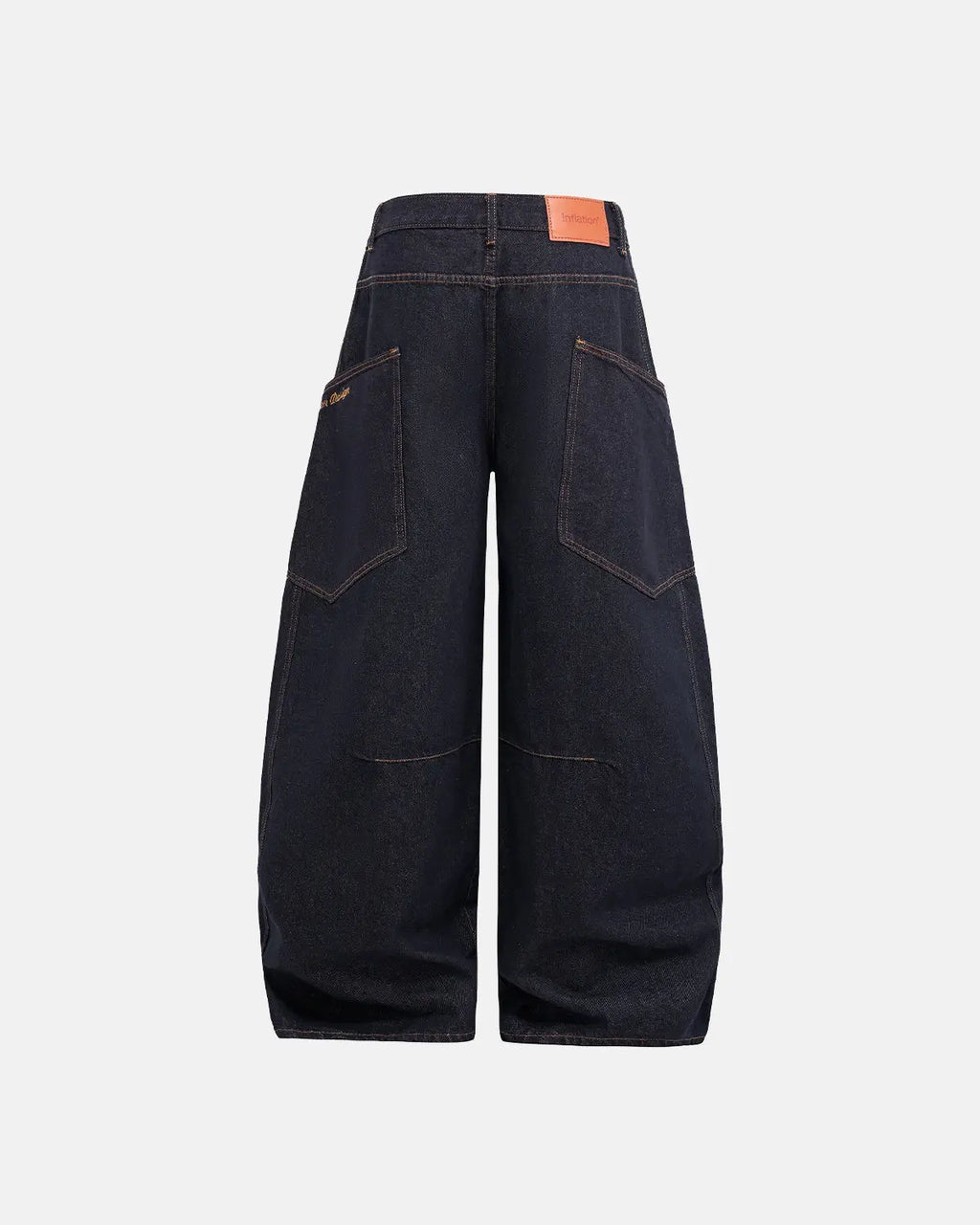 Inflation Super Raw Barrel Jeans with distressed denim and raw hem, showcasing a streetwear-inspired, relaxed fit style.