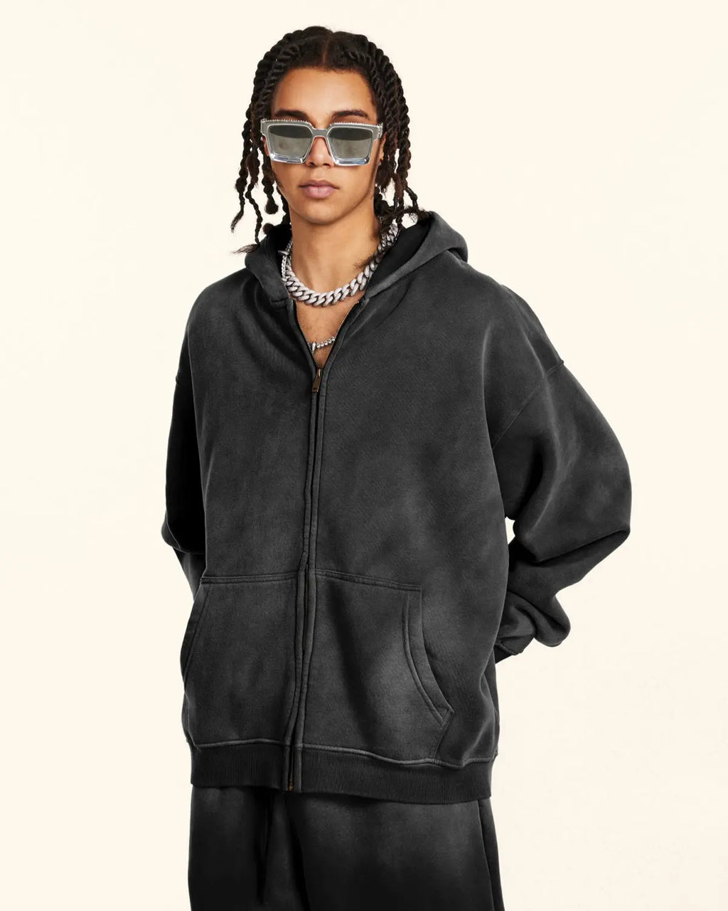 Acid washed zip-up hoodie by INFLATION Streetwear featuring a casual fit and distressed fabric, displayed on a hanger.