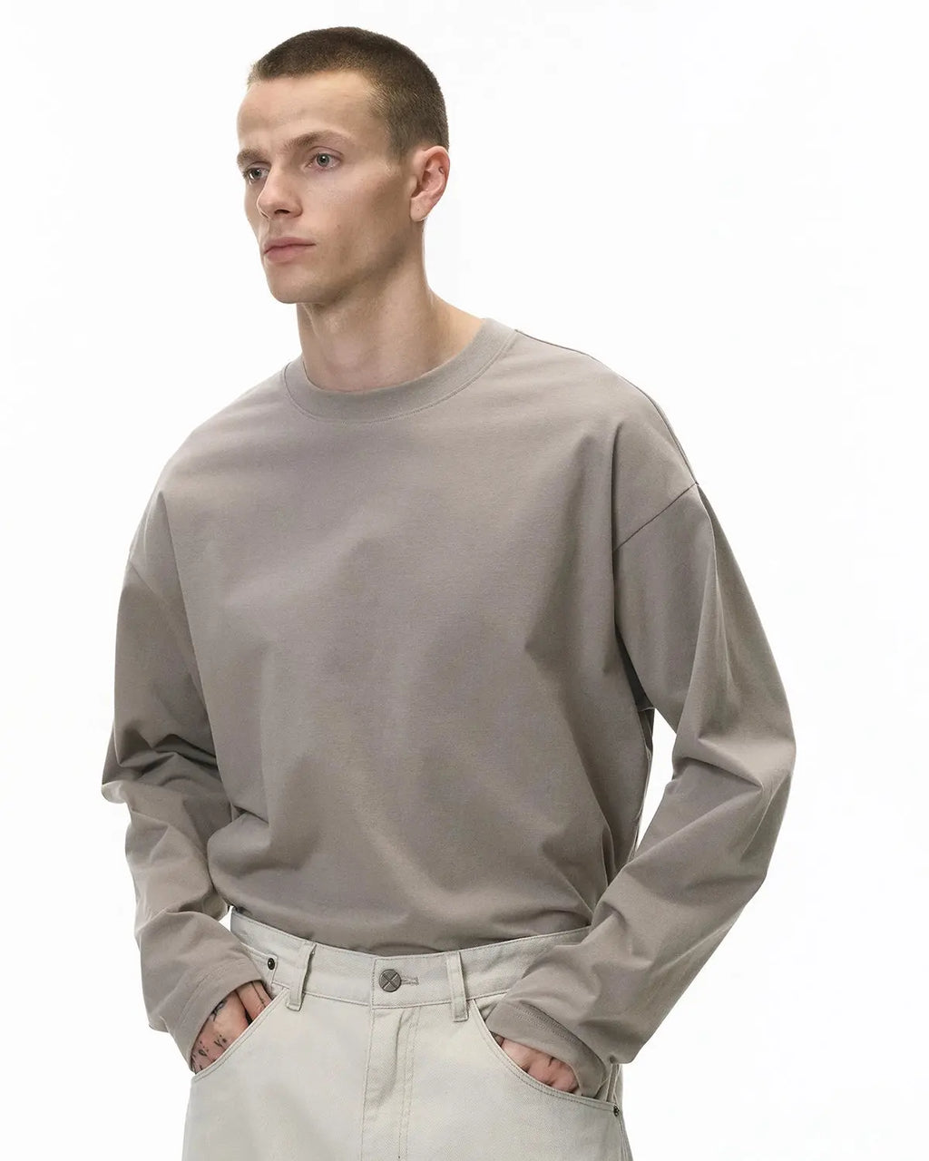 Plain white cotton long sleeve T-shirt by INFLATION, casual streetwear tee with a comfortable fit and simple design.