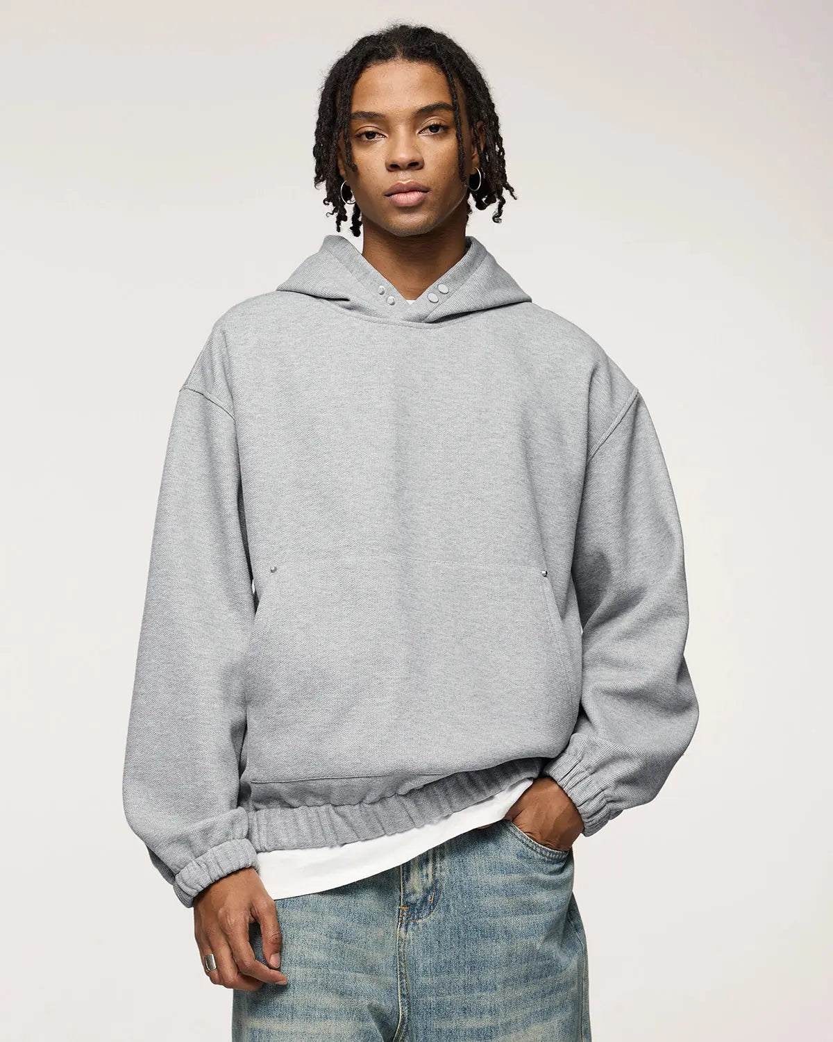Boxy cropped hoodie by Inflation Streetwear featuring a relaxed fit and bold logo design, displayed on a neutral background.