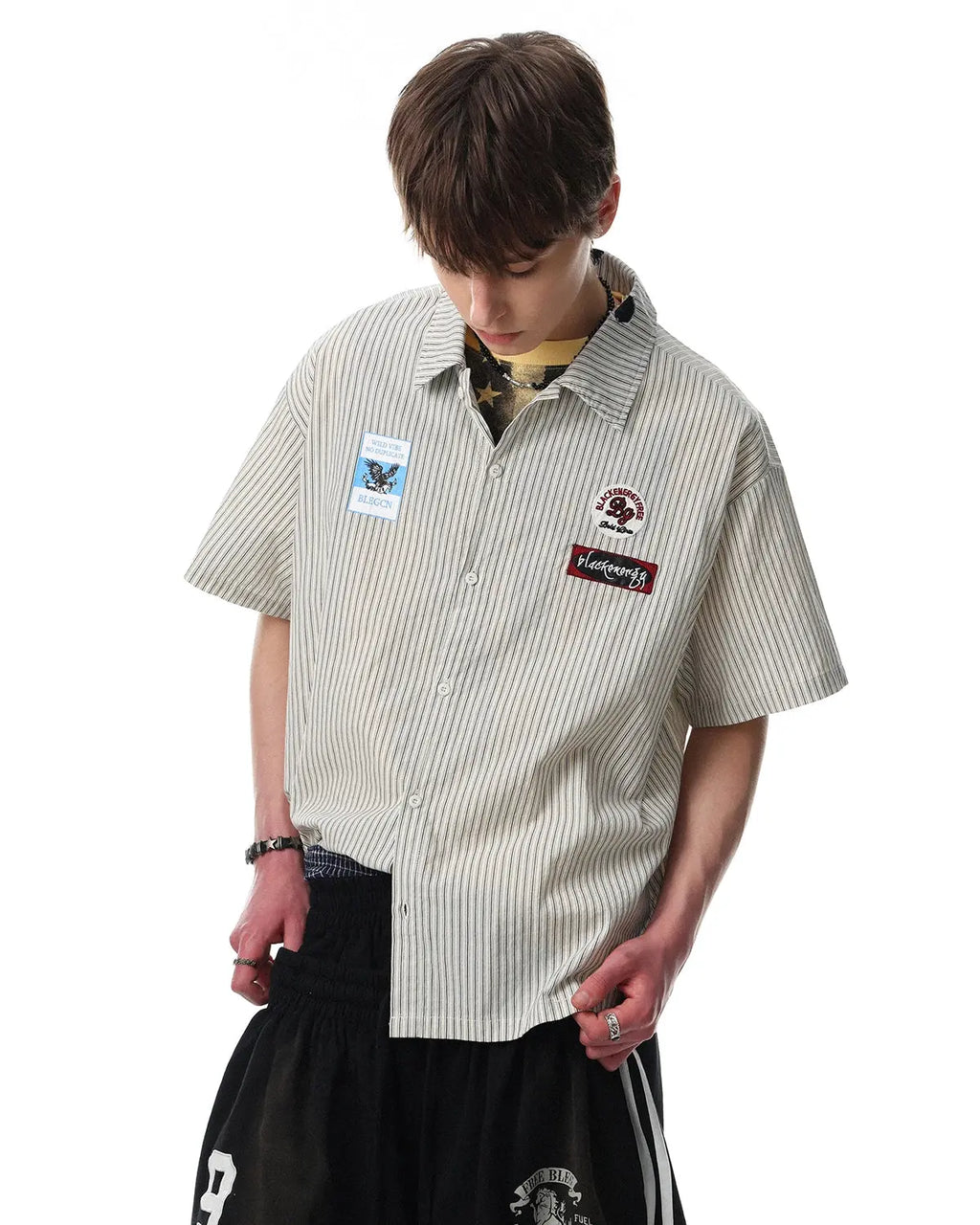 Inflation Streetwear graffiti patch striped shirt with bold colors and urban style, featuring graffiti designs on a casual shirt.
