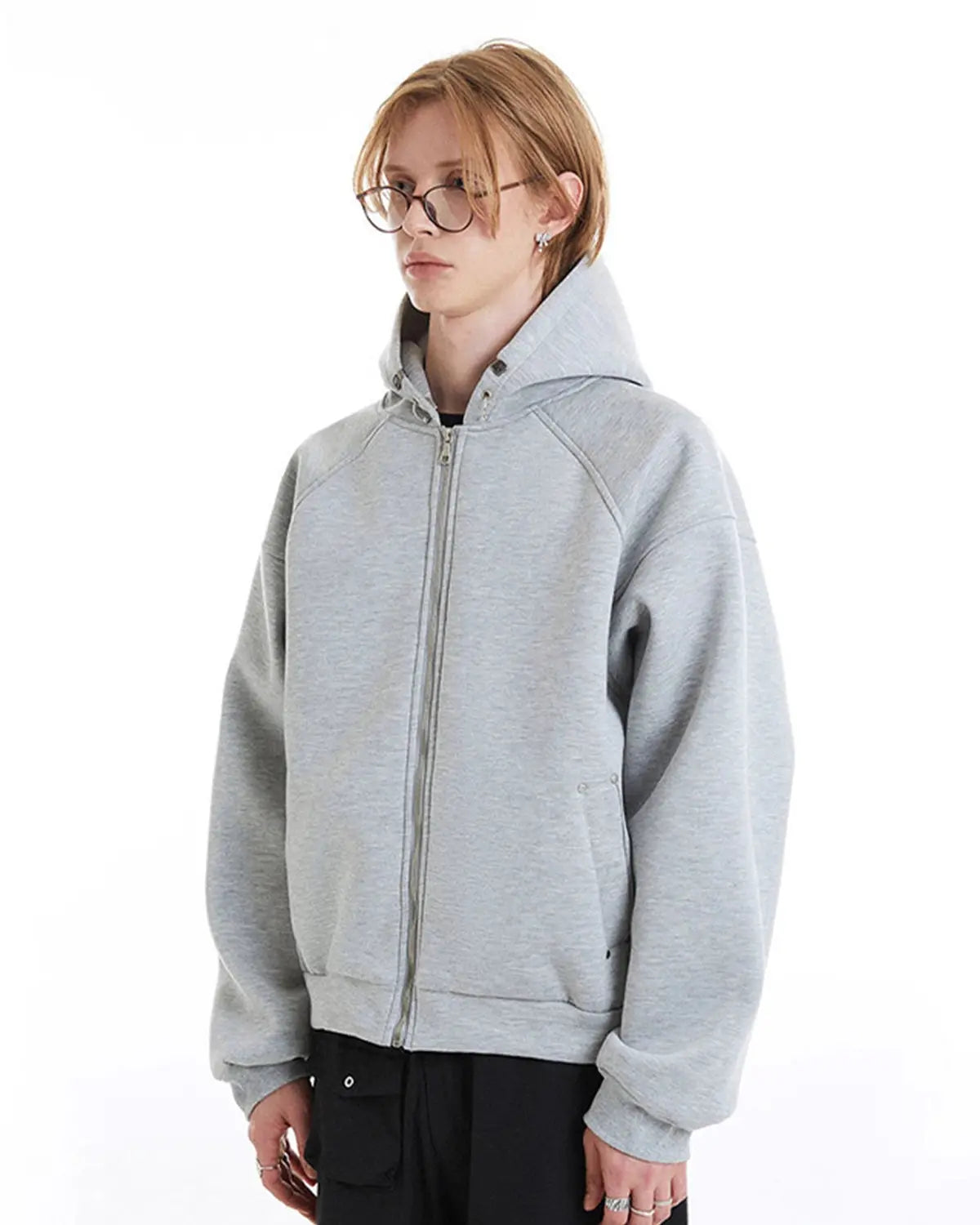 Grey boxy zip-up hoodie from INFLATION with a relaxed fit, front zipper, and casual style, shown on a hanger.