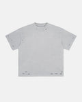 Inflation Streetwear ripped distressed washed oversized T-shirt with frayed holes and faded fabric, casual streetwear style.