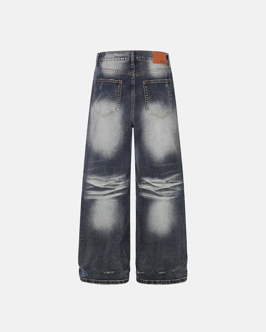 Faded Whisker Baggy Jeans by INFLATION featuring relaxed fit, distressed denim, and casual streetwear style.