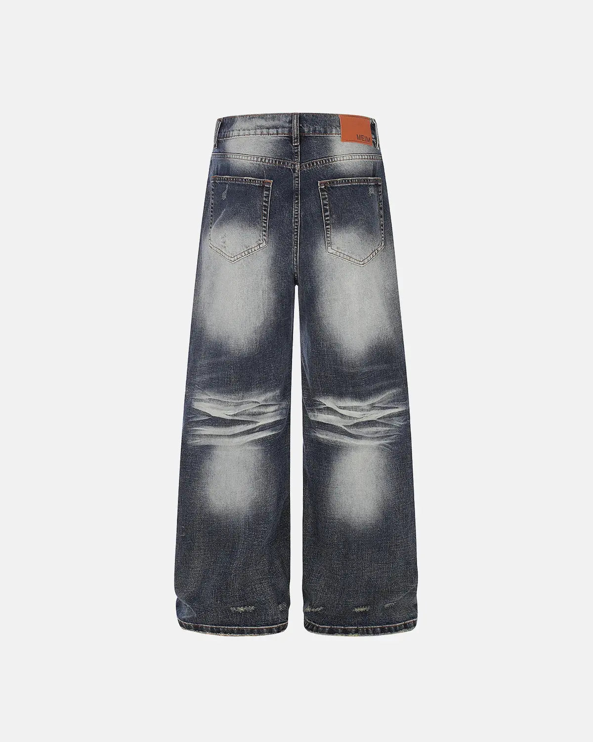 Faded Whisker Baggy Jeans by INFLATION featuring relaxed fit, distressed denim, and casual streetwear style.