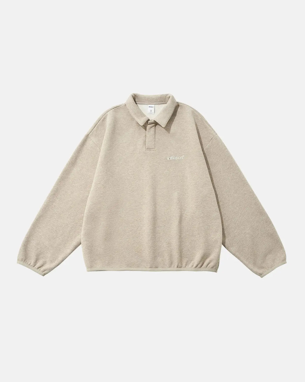 Inflation Streetwear quarter polo sweatshirt with a relaxed fit, featuring a classic collar and logo embroidery on the chest.