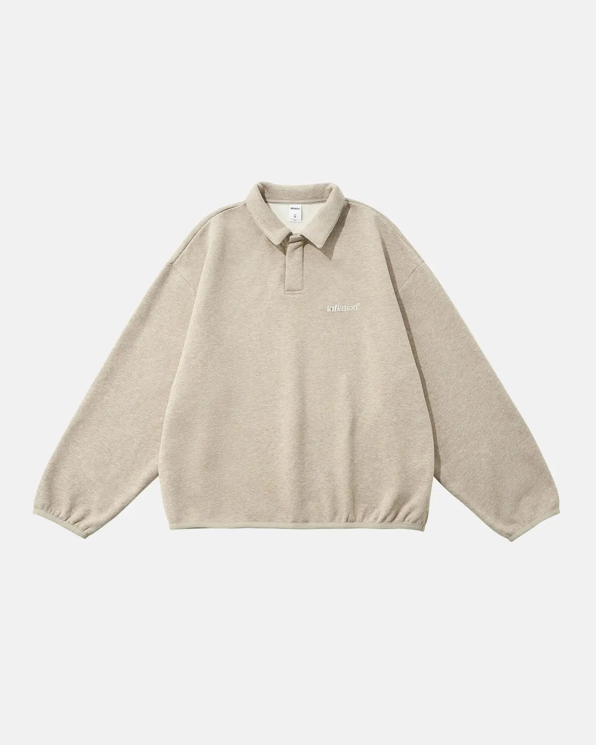 Inflation Streetwear quarter polo sweatshirt with a relaxed fit, featuring a classic collar and logo embroidery on the chest.