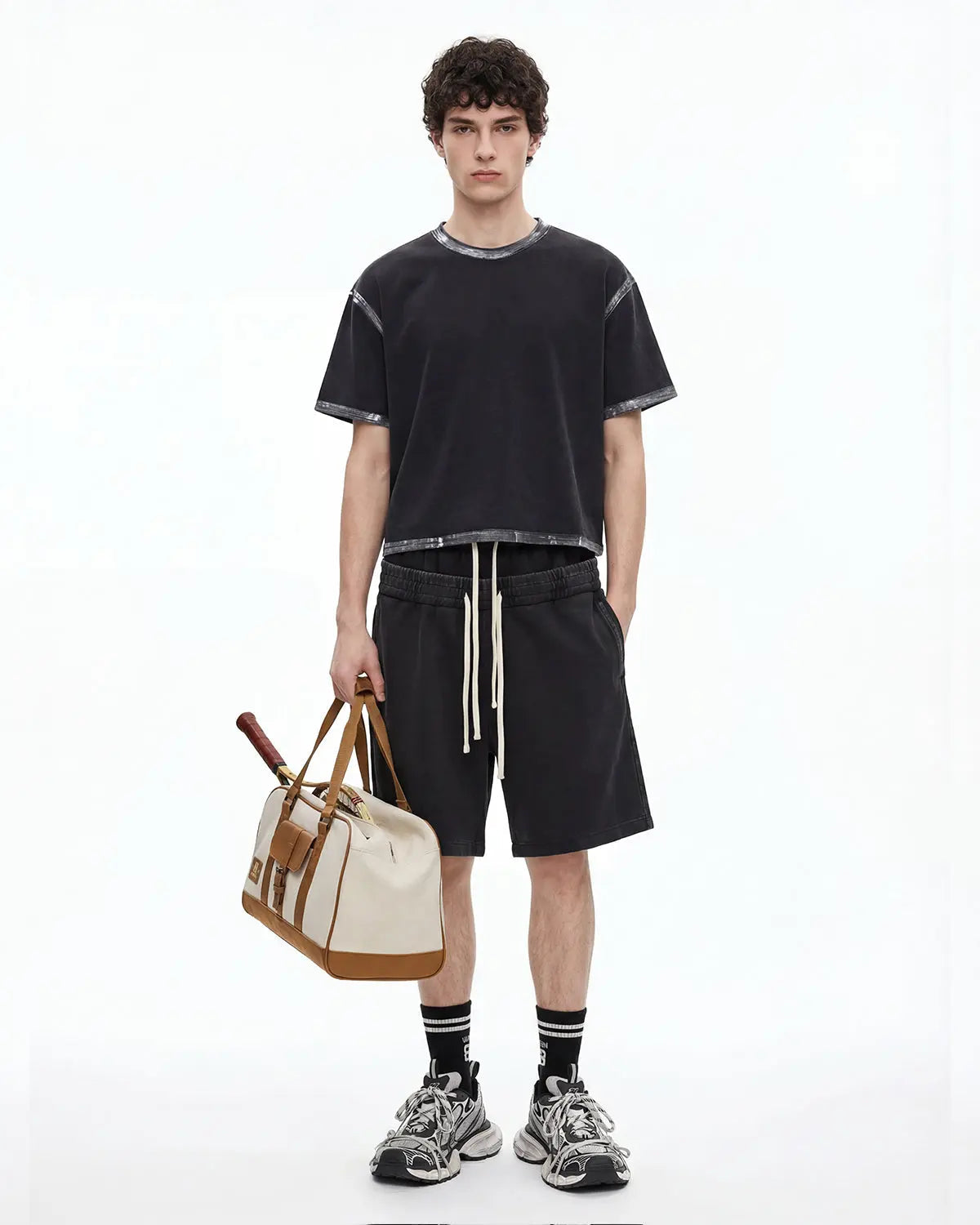 Inflation Streetwear Dirty Wash Heavyweight Boxy T-Shirt displayed on a model, showcasing the oversized fit and distressed fabric.