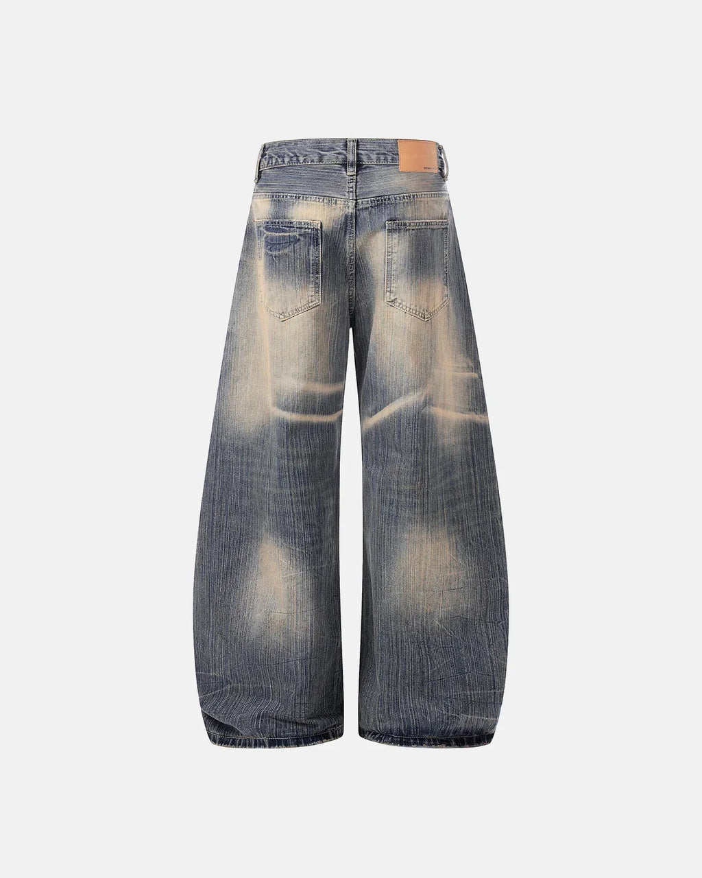 Inflation Bamboo Weave Dirty Wash Barrel Jeans showing distressed denim texture and relaxed fit, styled with casual streetwear look.