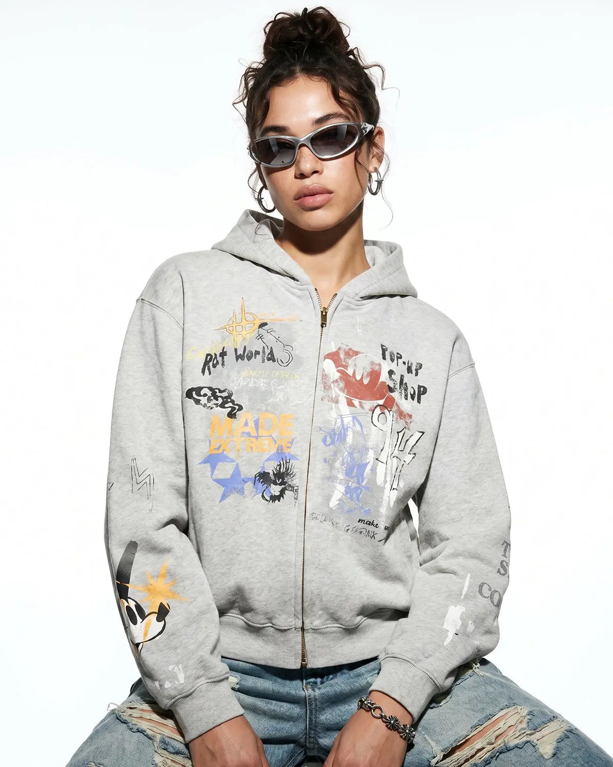 Boxy graffiti zip-up hoodie by Inflation Streetwear featuring bold graffiti design and comfortable fit.