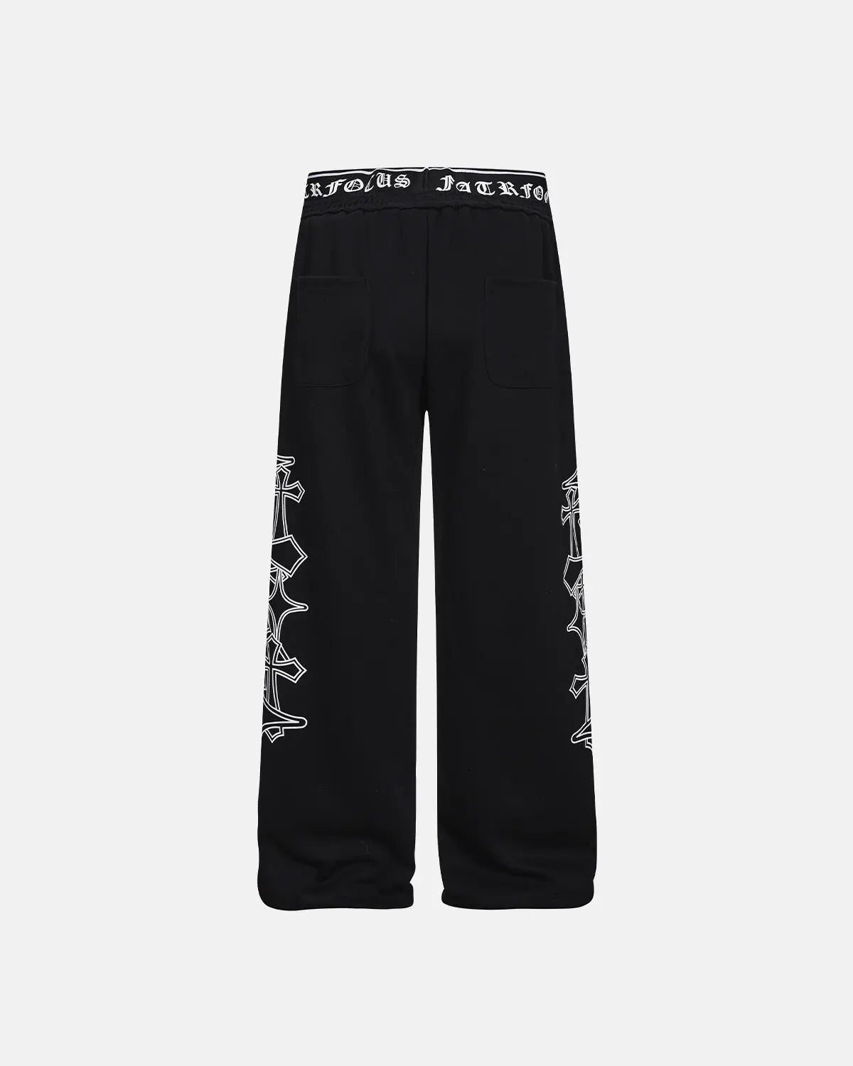 Black gothic layered baggy sweatpants by INFLATION with a loose fit and streetwear style, shown on a model.