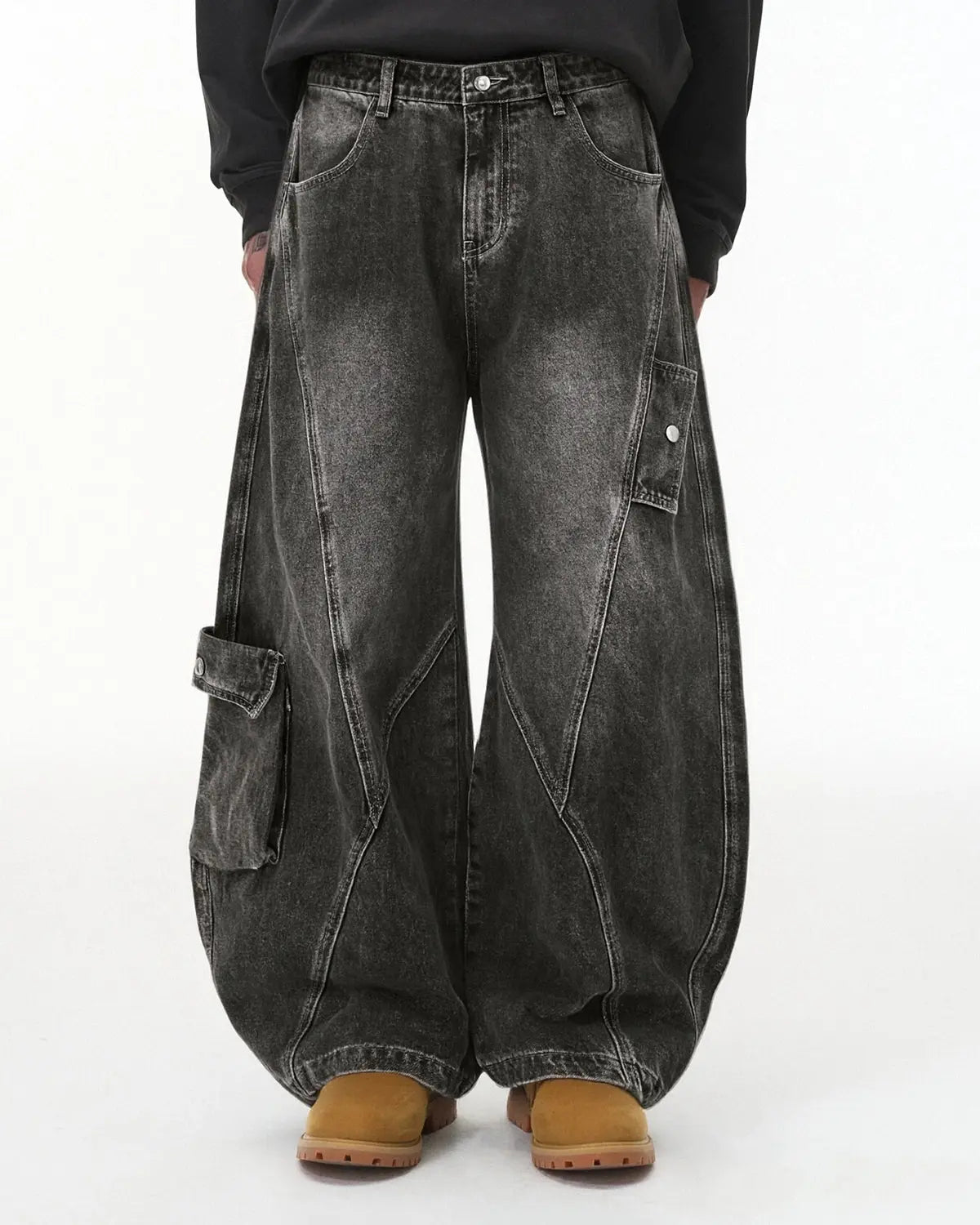 Distressed washed cargo barrel jeans by INFLATION featuring a relaxed fit and streetwear style with faded, ripped details.