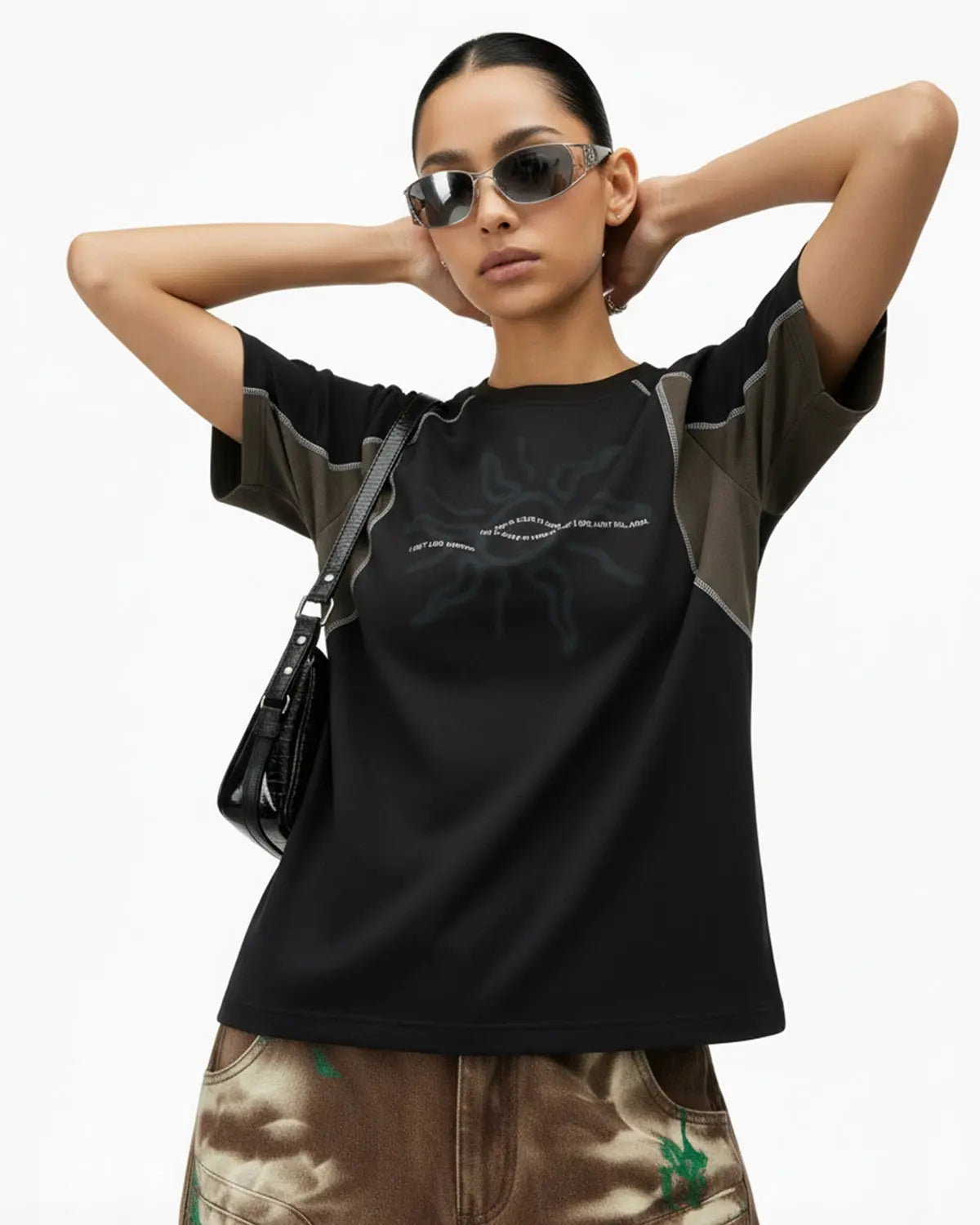 Inflation Streetwear Totem Graphic Patchwork T-shirt featuring bold patchwork and vibrant design on soft cotton fabric.