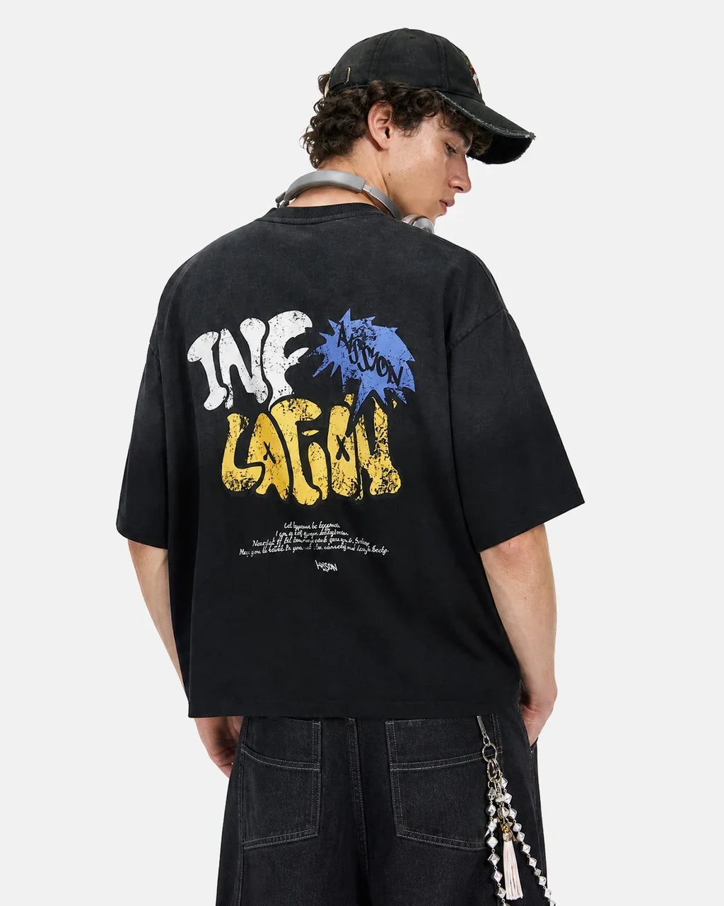 Washed boxy graphic T-shirt from INFLATION streetwear featuring bold printed design on soft cotton fabric.
