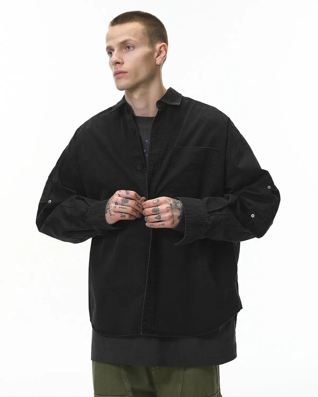 Acid wash cargo shirt jacket by INFLATION featuring multiple pockets and a relaxed streetwear style.