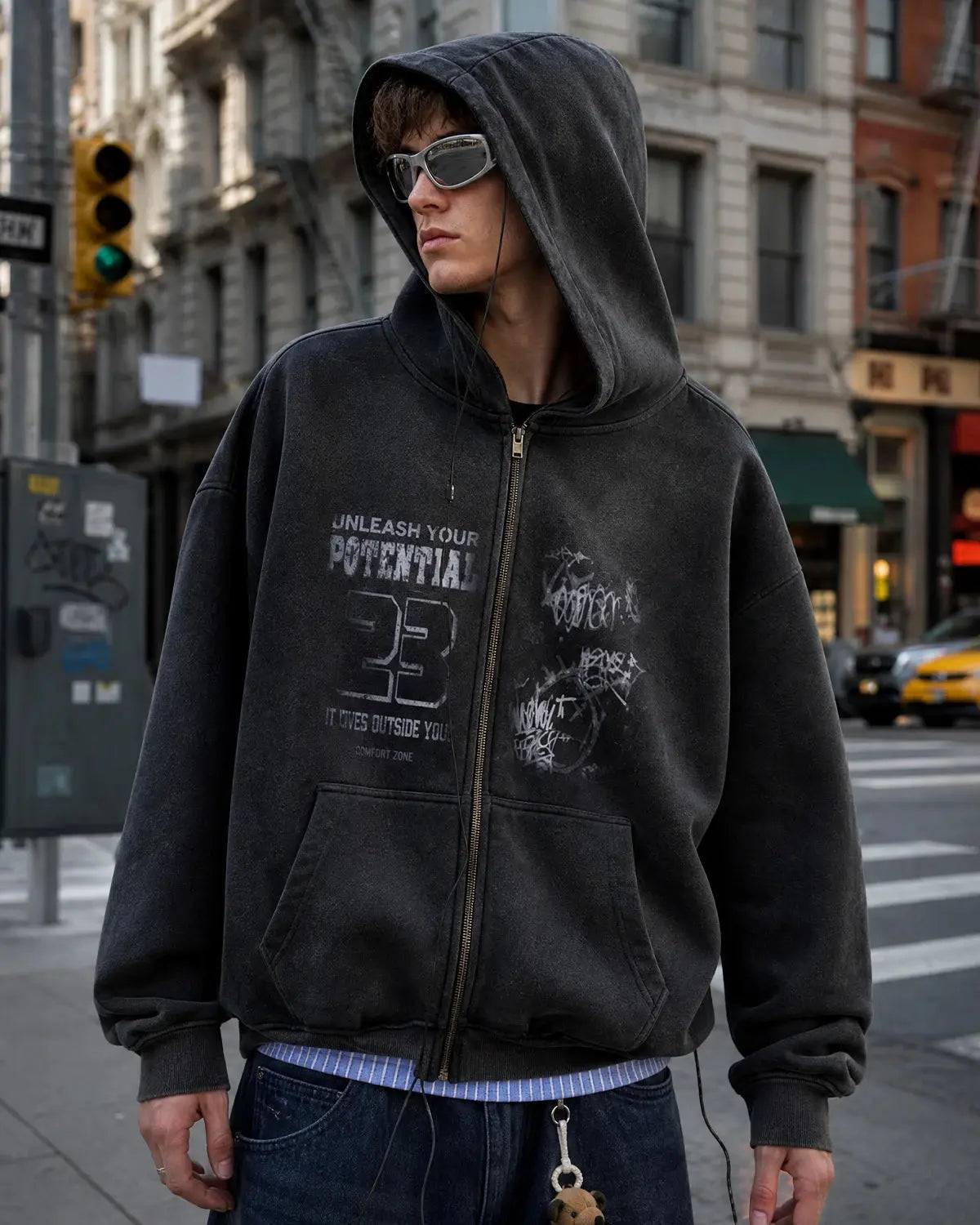 Inflation Streetwear graphic washed zip-up hoodie in black with bold front print and comfortable fit, casual streetwear style.