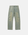 Vintage washed baggy jeans by INFLATION featuring a relaxed fit and distressed denim, styled with rolled cuffs.