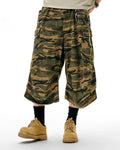 Inflation Camo Cargo Baggy Shorts featuring camouflage pattern, multiple pockets, and relaxed fit for streetwear style.