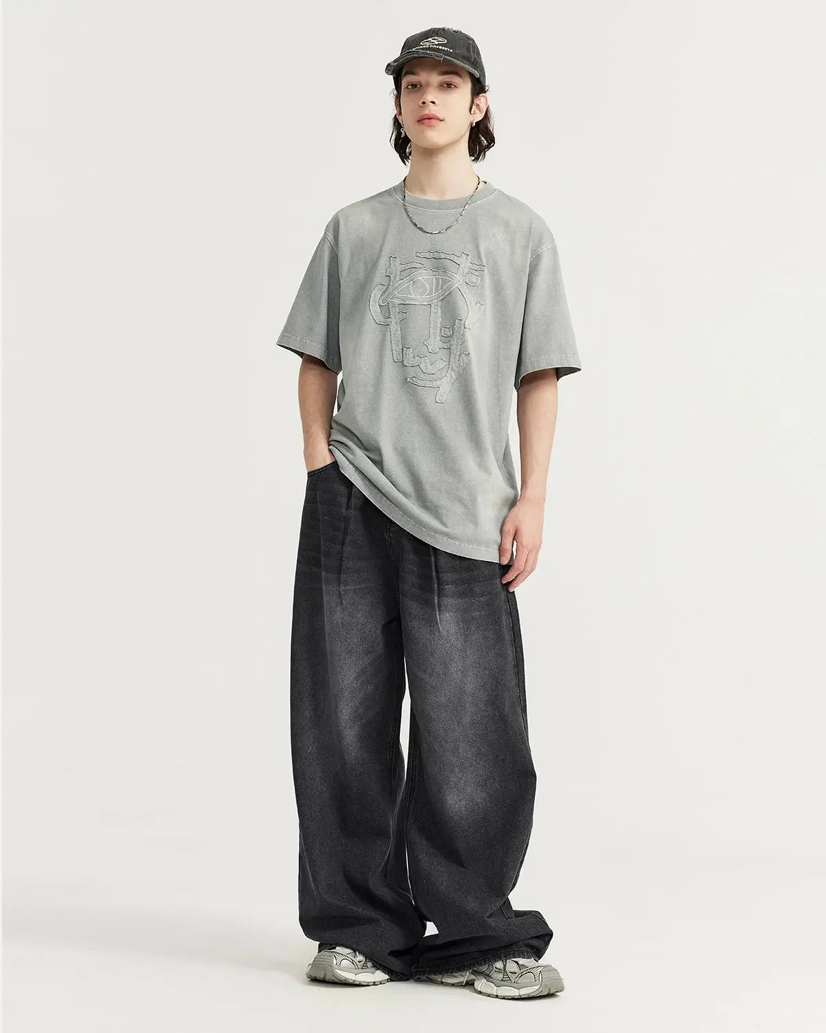 Inflation Chill wide-leg denim pants featuring a relaxed fit and classic blue denim, styled with a casual streetwear look.