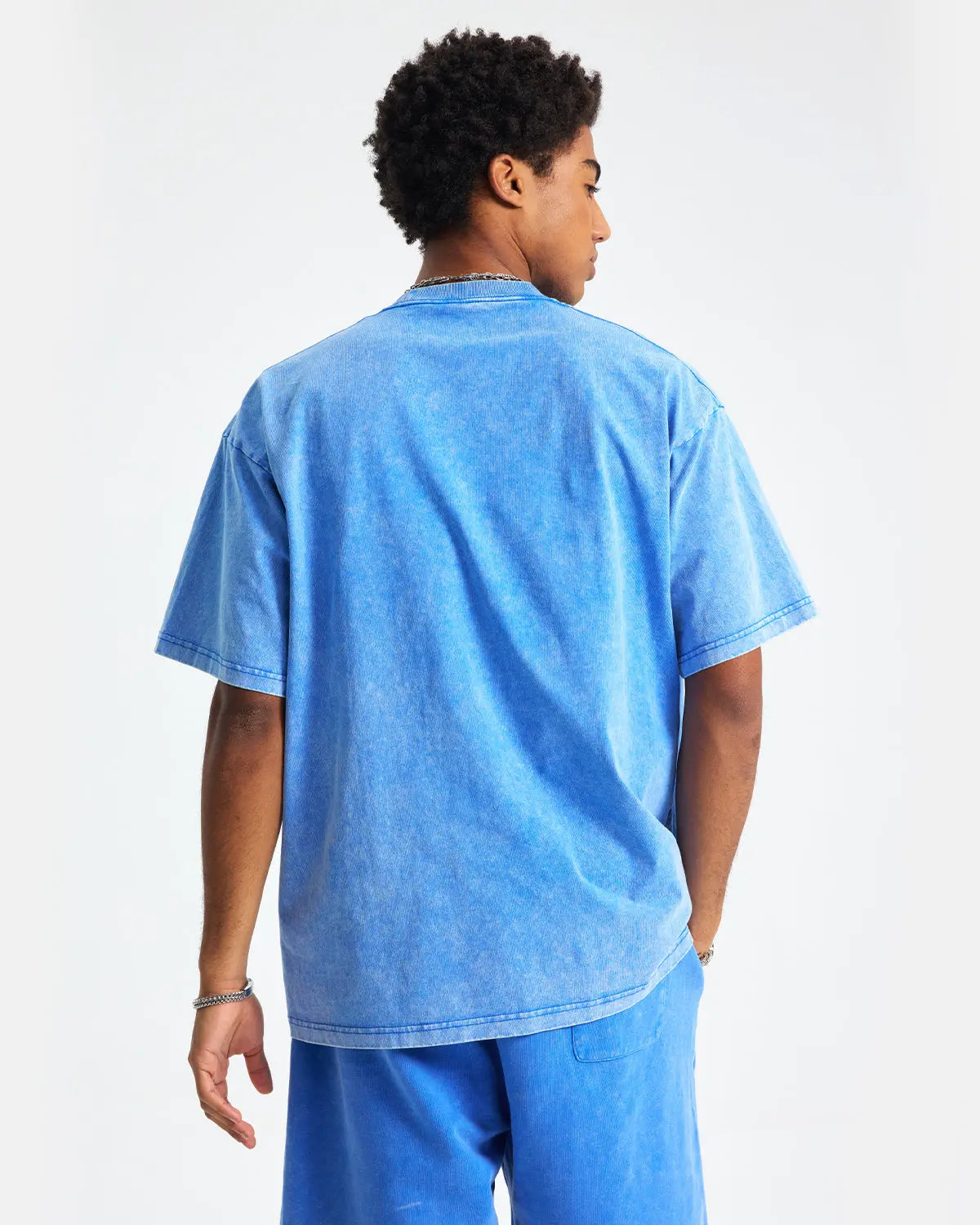 Inflation Streetwear Snow Washed Oversized T-Shirt in white with a relaxed fit and distressed, washed-out style.