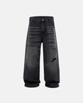 Distressed rhinestone ripped baggy jeans by INFLATION, featuring holes, rhinestones, and a relaxed streetwear style.